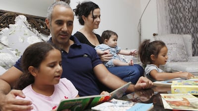 Would fathers doing more parenting roles reduce our reliance on domestic helpers? Jeffrey E Biteng / The National