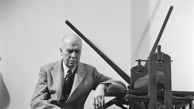 circa 1955: American realist painter, Edward Hopper (1882-1967) sitting by a manual printing press in his Greenwich Village studio. Three Lions / Getty Images