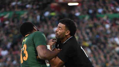 Lukhanyo Am of the Springboks and Richie Mounga of New Zealand battle for the ball. Getty