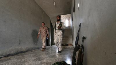 Fighters from the Syria Democratic Forces (SDF) inside a safe house near Manbij, Syria, on June 21, 2016.Rodi Said / Reuters