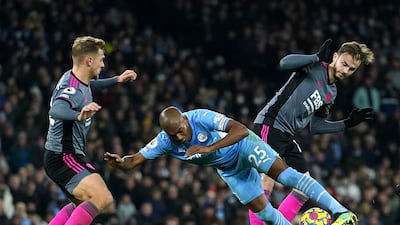 Manchester City's Fernandinho battles for the ball with Leicester City's Kiernan Dewsbury-Hall, left, and James Maddison during the Premier League match at the Etihad Stadium, Manchester on December 26, 2021. PA