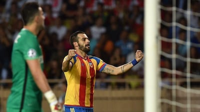 Alvaro Negredo of Valencia celebrates after scoring against Monaco on Tuesday night in a 4-3 aggregate win in the Champions League play-off round. Vlaerio Pennicino / Getty Images