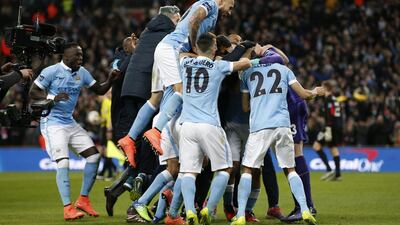 Manchester City’s Yaya Toure celebrates scoring during the penalty shoot-out with teammates. Action Images via Reuters / Paul Childs