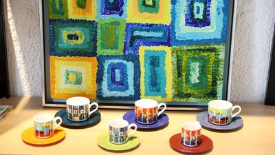 Colourful artwork reproduced on cups and tableware. Pawan Singh / The National