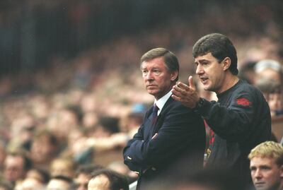 In this file photo from October 1995 Manchester United manager Alex Ferguson and assistant Brian Kidd. Ferguson is well known for keeping in touch with his former players, dispensing advice. MarkThompson / Allsport