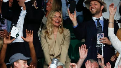 Sienna Miller in Ralph Lauren on day seven of the Wimbledon Tennis Championships. AP