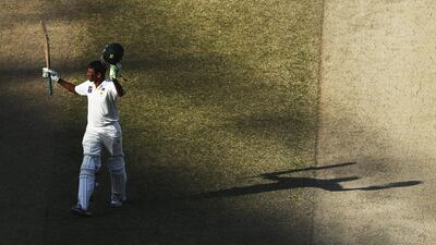 Younis Khan of Pakistan celebrates after reaching his century during Day Four of the First Test between Pakistan and Australia at Dubai International Stadium on October 25, 2014 in Dubai, United Arab Emirates. Ryan Pierse / Getty Images