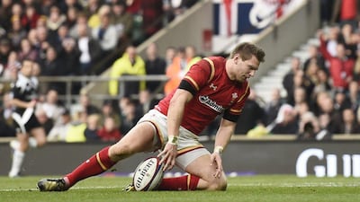 Dan Biggar scores the first try for Wales. Reuters / Toby Melville
