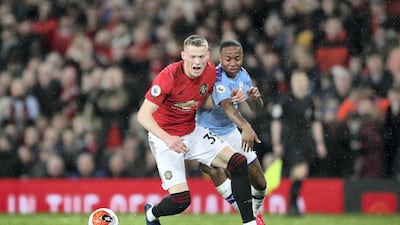 Manchester United's Scott McTominay (left) and Manchester City's Raheem Sterling battle for the ball. Getty Images