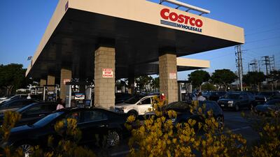 Drivers in Hawthorne, California wait in line to pump fuel as the price of regular petrol reaches above $5.89 a gallon and premium fuel tips over $6 per gallon. AFP