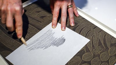 Children can do brass rubbings to get a sense of the rooster's intricate designs. Victor Besa / The National