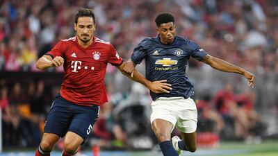 Manchester United's Marcus Rashford in action with Bayern Munich's Mats Hummels. Reuters