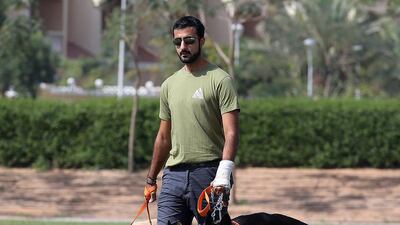 Hussain Darwish, organiser of the K9 Challenge, with his own dogs in Dubai. Satish Kumar / The National