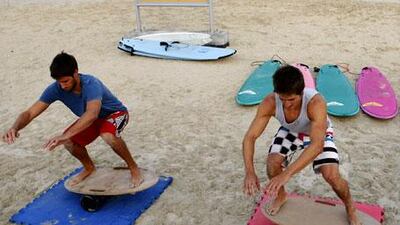 Jason Smith and James Oliver, Surf Dubai warm up before class.