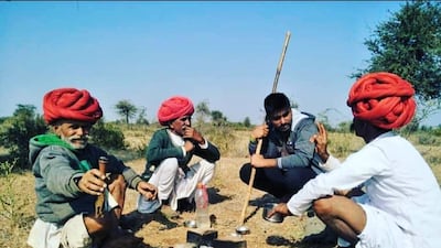Rabari men traditionally wear white dhotis, red turbans and silver amulets. Courtesy Jawai Wild Camp