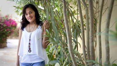 Grace Rosalin says she sends money home to the Philippines at an exchange house in Mall of the Emirates. Razan Alzayani / The National