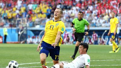 Kim Min-Woo fouls Viktor Claesson to award Sweden a VAR-led penalty. Jan Kruger / Getty Images