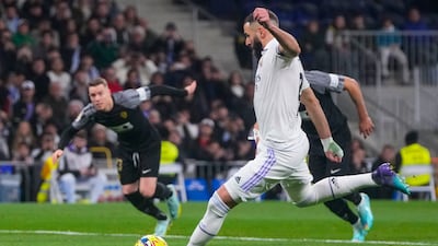 Real Madrid's Karim Benzema scores his side's third goal from the penalty spot. AP Photo