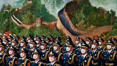 Chinese military guards prepare for the arrival of Prime Minister Li Qiang and Barbados Prime Minister Mia Mottley, at the Great Hall of the People in Beijing. EPA