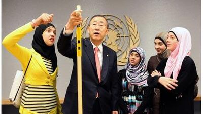 The UN secretary general, Ban Ki-moon, is impressed by the walking stick with infrared sensors invented by three Palestinian schoolgirls. Michael Falco for The National