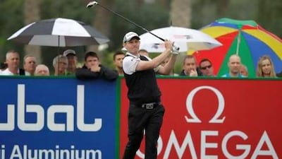 Stephen Gallacher tees off on the first hole during third round of the Dubai Desert Classic Golf.