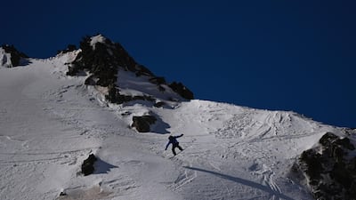 US rider Nils Mindnich competes in the men snowboard event at the Freeride World Tour skiing and snowboarding competition in Ordino-Arcalis Mountain Resort, Andorra, on Friday, February 19. AFP