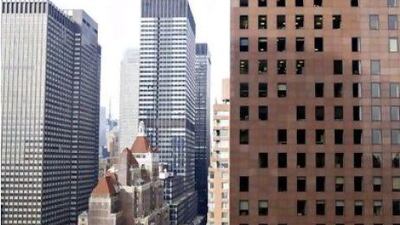 Google recently paid $1.8 billion to buy its headquarters building in Manhattan. Above, a typical corner office view in the borough.