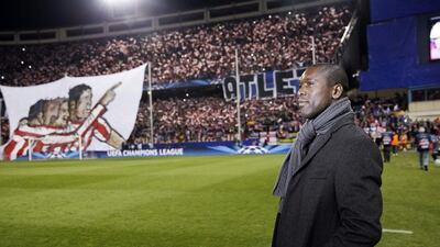 Clarence Seedorf and AC Milan are 11th in Serie A with nine wins, eight draws and 11 losses. Juanjo Martin / EPA