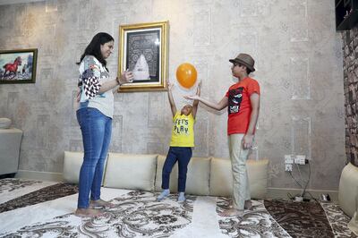 Ms Matheranwala is send eidiyah to family members elsewhere using online money transfer channels. Pawan Singh / The National