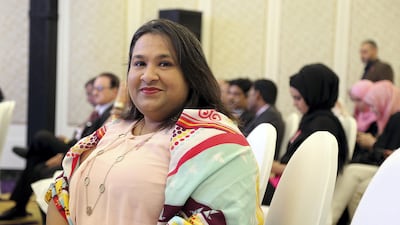 Umaima Tinwala, who survived breast cancer after buying cheaper chemotherapy drugs in India, speaks at the launch of the Pink it Now screening programme in Dubai. She found her treatment was not covered under her medical insurance. Satish Kumar for The National