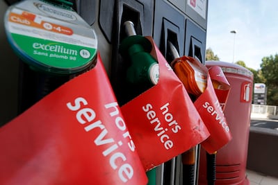A sign reads 'Out of service' on a pump at a Total Energies gas station in Nice, France where some gas stations are experiencing shortages following record increases in fuel prices. EPA