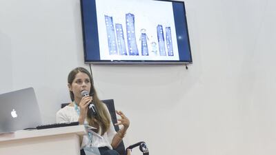 Children’s author and illustrator Nadine Kaadan talks about her latest book, The Jasmine Sneeze, at Abu Dhabi International Book Fair on Friday. Khushnum Bhandari / The National