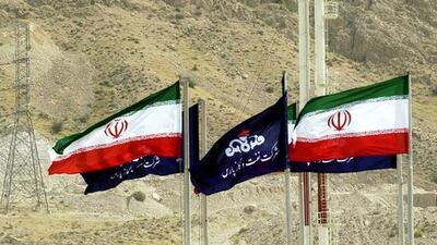 3rd: National Iranian Oil Co. - 6 million boepd. Pictured, Iranian national flags and flags of Iran's national oil company fly under torches that burn excess-gas at a part of the facility of the phases 4 and 5 of South Pars gas field. AP Photo