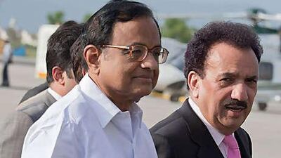 New talks will concentrate on building trust. Above, Palaniappan Chidambaram, India's home minister, with Rehman Malik, Pakistan's interior minister, in Rawalpindi last month.