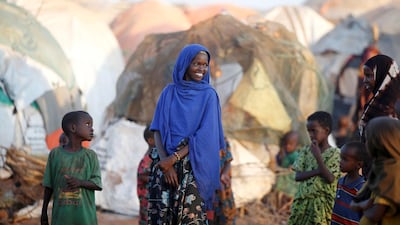 A girl stands in front of a makeshift shelter at the new Kabasa internally displaced camp in the northern Somali town of Dollow, Somalia. REUTERS