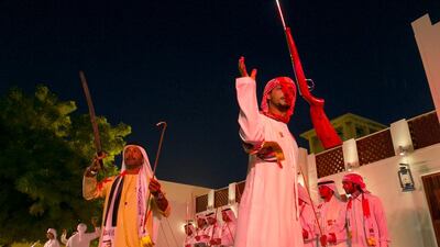 An al razfa dance performance at the Dubai Heritage Village to mark National Day. Reem Mohammed / The National