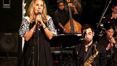 Sinead Keane, a singer in the Abu Dhabi Big Band, performs at One to One Hotel last night.