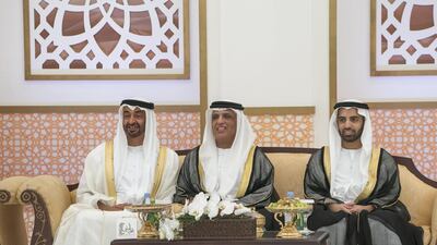 Sheikh Mohammed bin Zayed, Crown Prince of Abu Dhabi and Deputy Supreme Commander of the UAE Armed Forces, left, attends the mass wedding reception. Seen with Sheikh Saud bin Saqr Al Qasimi, Ruler of Ras Al Khaimah, centre and Sheikh Mohamed bin Saud, Crown Prince of Ras Al Khaimah. Mohammed Al Hammadi / Crown Prince Court - Abu Dhabi
