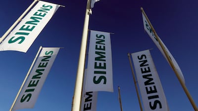 Siemens has stopped sales of power generating turbines to Russian state-controlled companies. Matthias Schrader / AP Photo