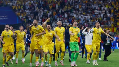 Romania players celebrate after the match after sealing their last-16 spot. Reuters