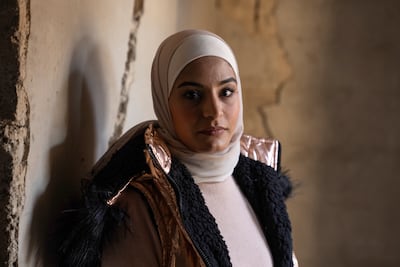 Alaa Qasar is clinging on to belief that her father could be alive. Matt Kynaston / The National