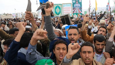 Houthi supporters shout slogans during a protest in Sanaa, Yemen, on September 18. The international community has spent too long asking where the rebels might strike next, and not enough asking how they are getting the resources to keep striking. EPA