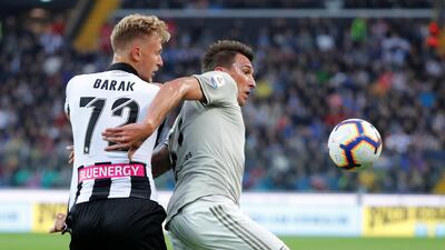 Udinese's Antonin Barak in action with Mandzukic. Reuters