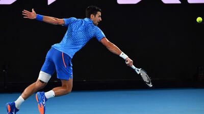 Novak Djokovic hits a return against Roberto Carballes Baena. AFP