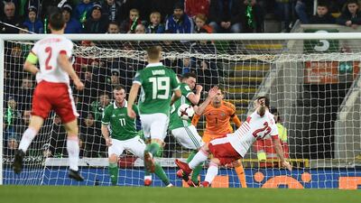Xherdan Shaqiri of Switzerland is awarded a penalty after alleged handball by Corry Evans of Northern Ireland. Charles McQuillan / Getty Images