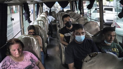 Commuters ride a bus in the Nabaa neighbourhood of Beirut, Lebanon. NurPhoto via Getty Images