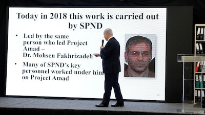 Israeli Prime Minister Benjamin Netanyahu points at a screen with an image of Iranian nuclear scientist Mohsen Fakhrizadeh during a news conference at the Defence Ministry of in Tel Aviv on April 30, 2018. Reuters
