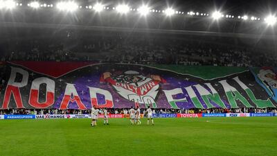 UAE fans wave a banner during the 2019 AFC Asian Cup quarter-final match between UAE and Australia in Al-Ain. AFP