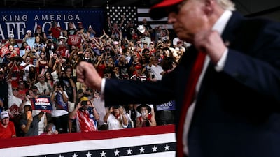 Donald Trump at a rally in North Carolina for Senate candidate Michael Whatley. The President's low approval rating is likely to deepen Republican midterm losses. AFP