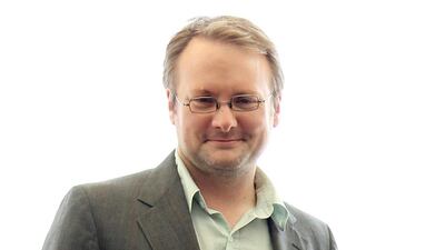 Writer and director Rian Johnson, left, actress Emily Blunt, center, and actor Joseph Gordon-Levitt, from the upcoming film "Looper", pose for a portrait during Comic-Con, Friday, July 13, 2012, in San Diego. (Photo by Matt Sayles/Invision/AP)
